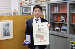 受賞の望月信介教授